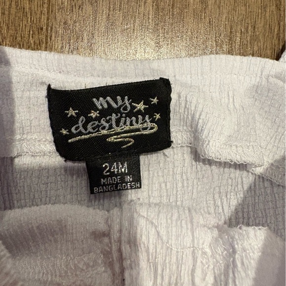 Charming White Ruffle Top and Black Checkered Shorts Set - Picture 3 of 3